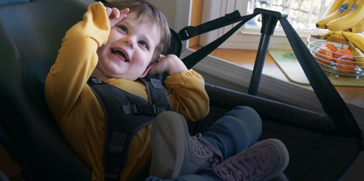 Lina sitting in a rocking chair